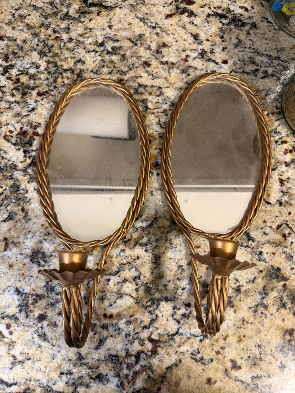 Pair of Oval Gold Wall Mirrors with Candle Holders